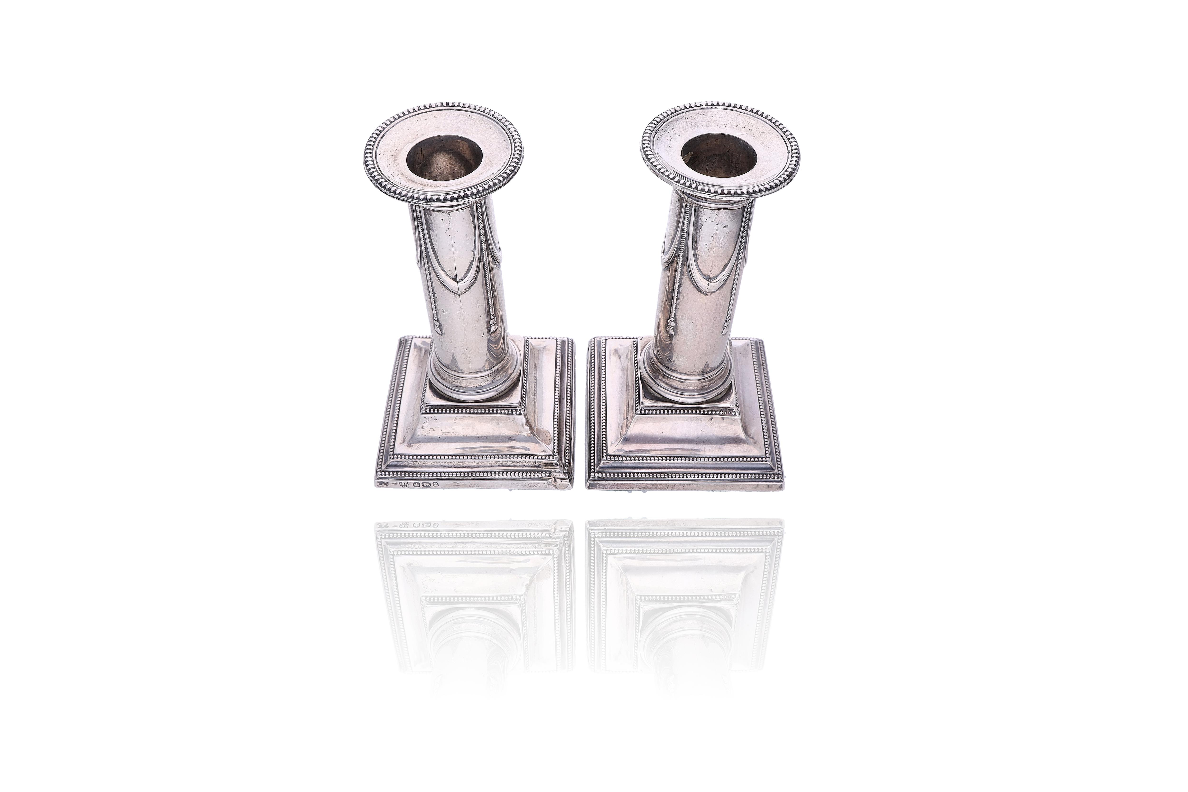 Hawksworth, Eyre & Co Ltd, coppia di candelieri in argento - Asta Preziosi