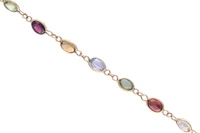 Bracciale con peridoti, granati, quarzi e topazi - Asta Preziosi