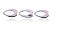 Tre anelli con diamanti, diamanti neri e pietre - Asta Preziosi