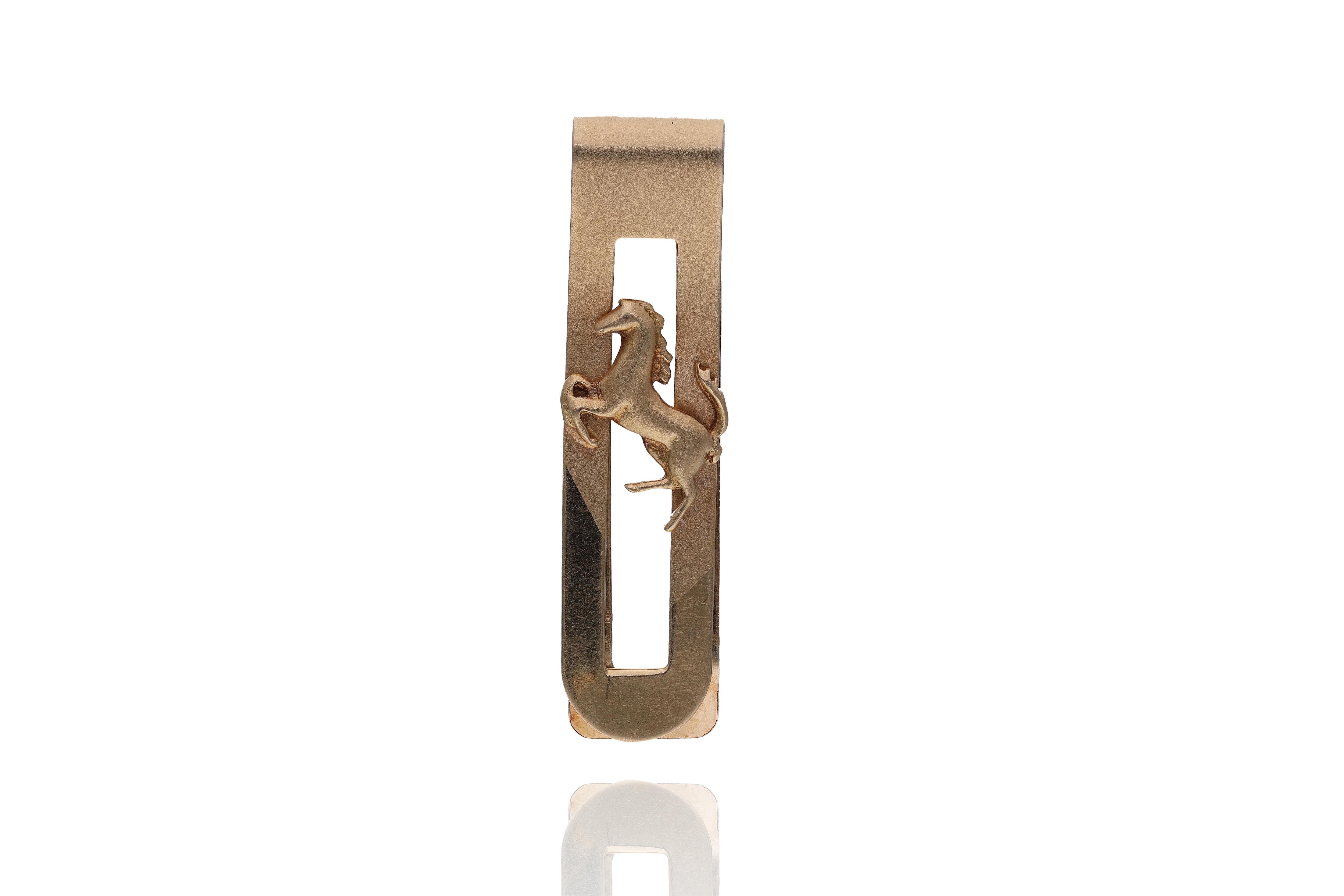 Fermasoldi in oro - Asta Preziosi