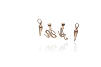 Quattro ciondoli con diamanti - Asta Preziosi