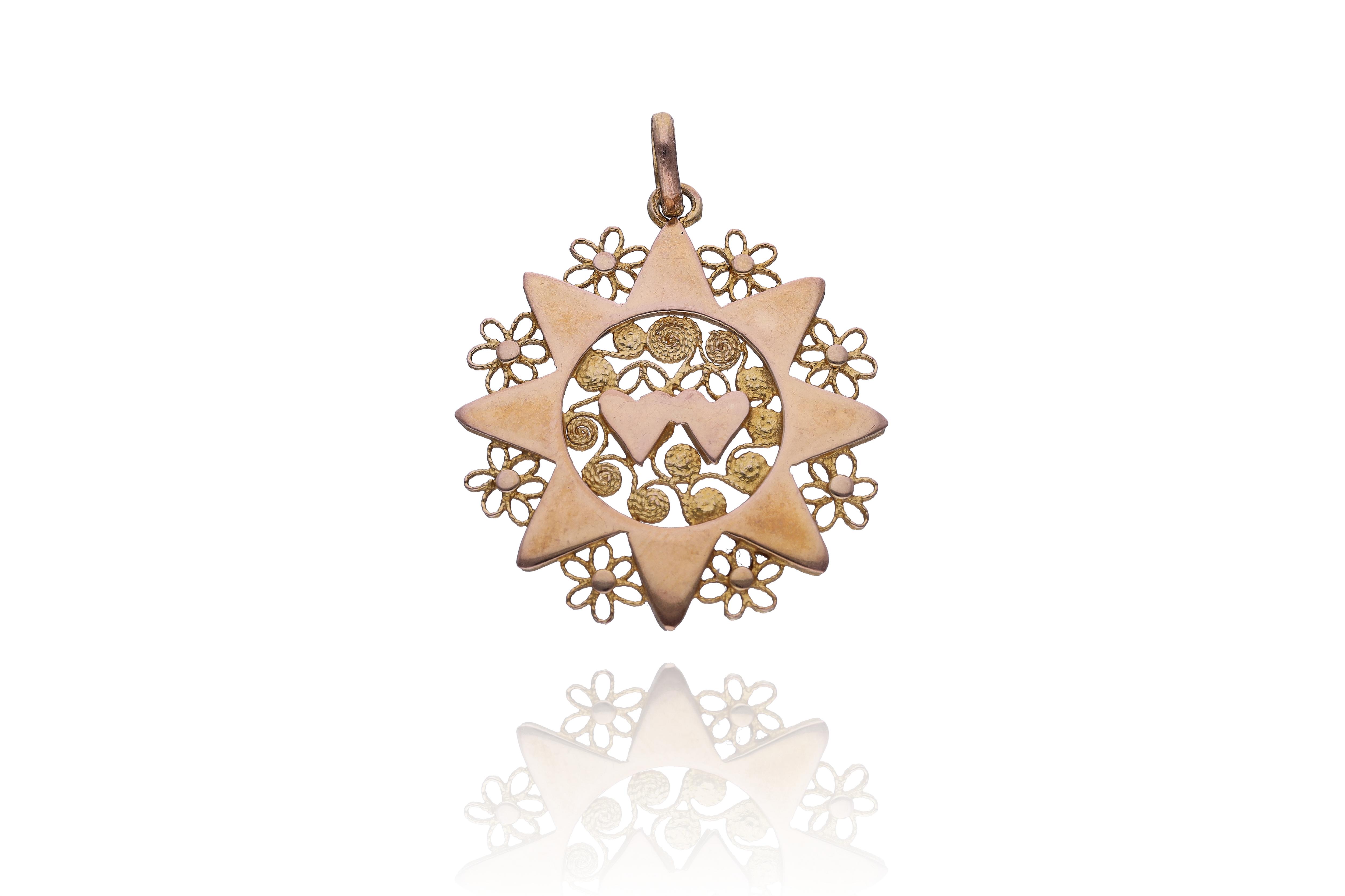 Ciondolo in oro - Asta Preziosi