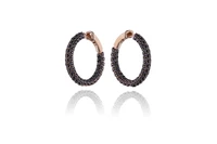 Orecchini con diamanti neri - Asta Preziosi