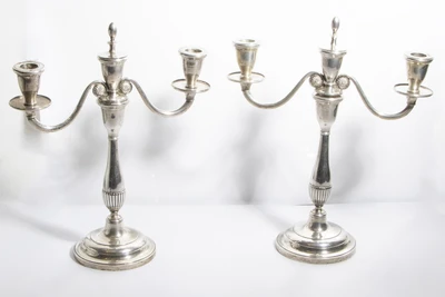 Coppia di candelieri in argento - Asta Preziosi