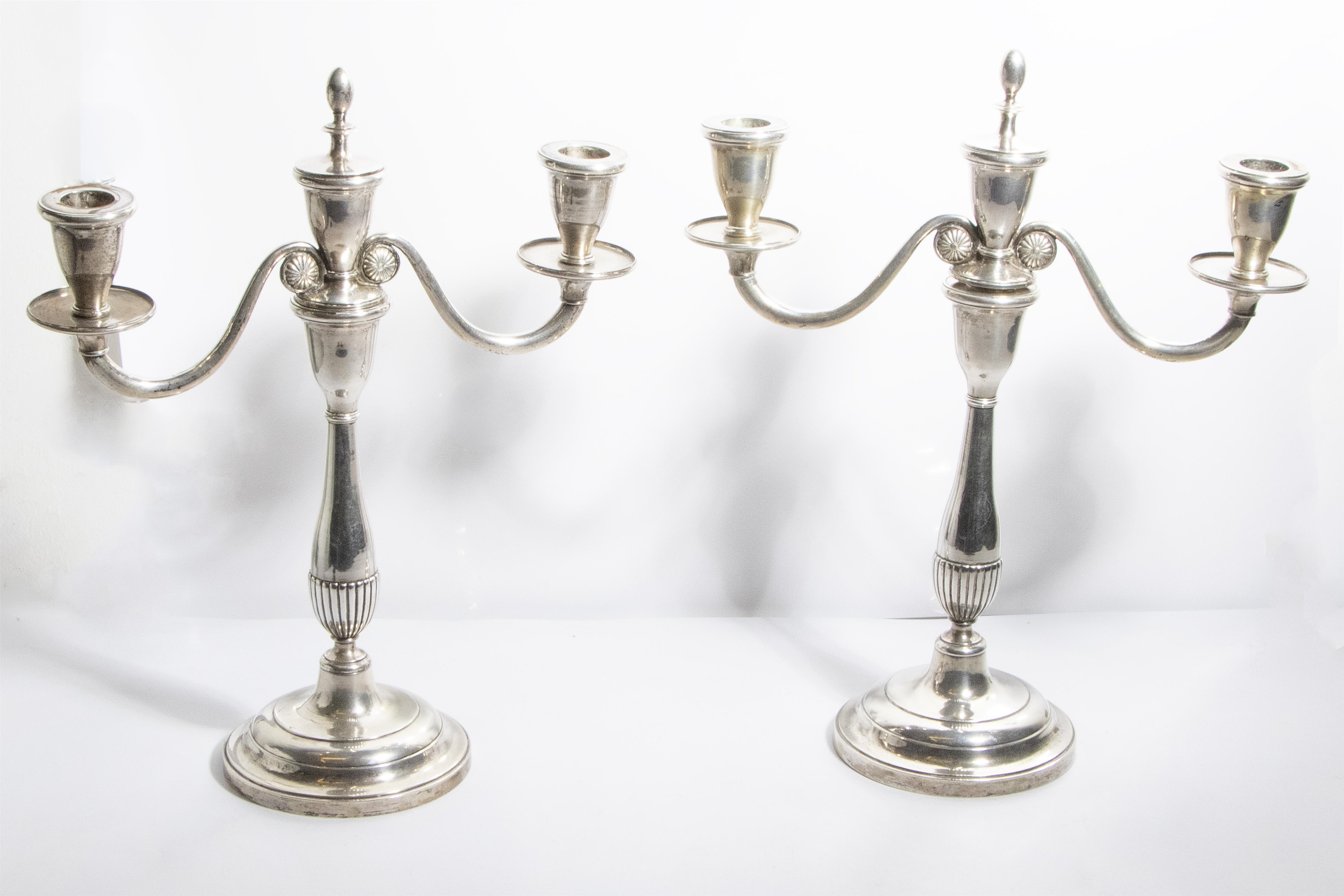 Coppia di candelieri in argento - Asta Preziosi