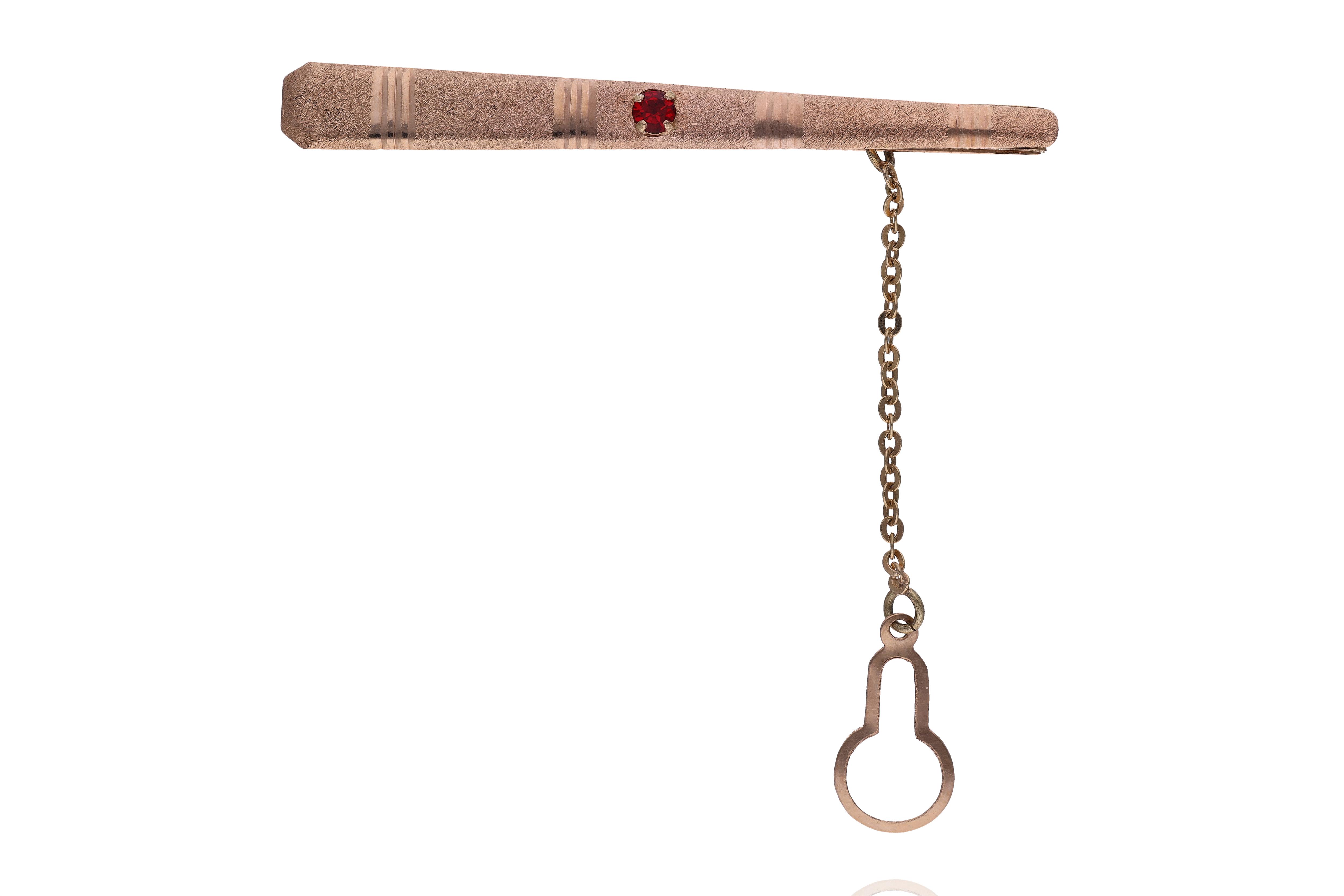 Fermacravatte con pietra - Asta Preziosi