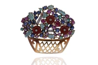 Spilla con rubini, zaffiri, smeraldi, diamanti e pietre - Asta Preziosi