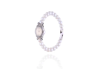Bracciale con orologio, perle coltivate e diamanti - Asta Preziosi