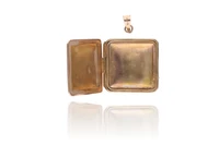 Ciondolo portafoto in oro - Asta Preziosi