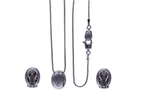 Damiani, collana con pendente e orecchini - Asta Preziosi