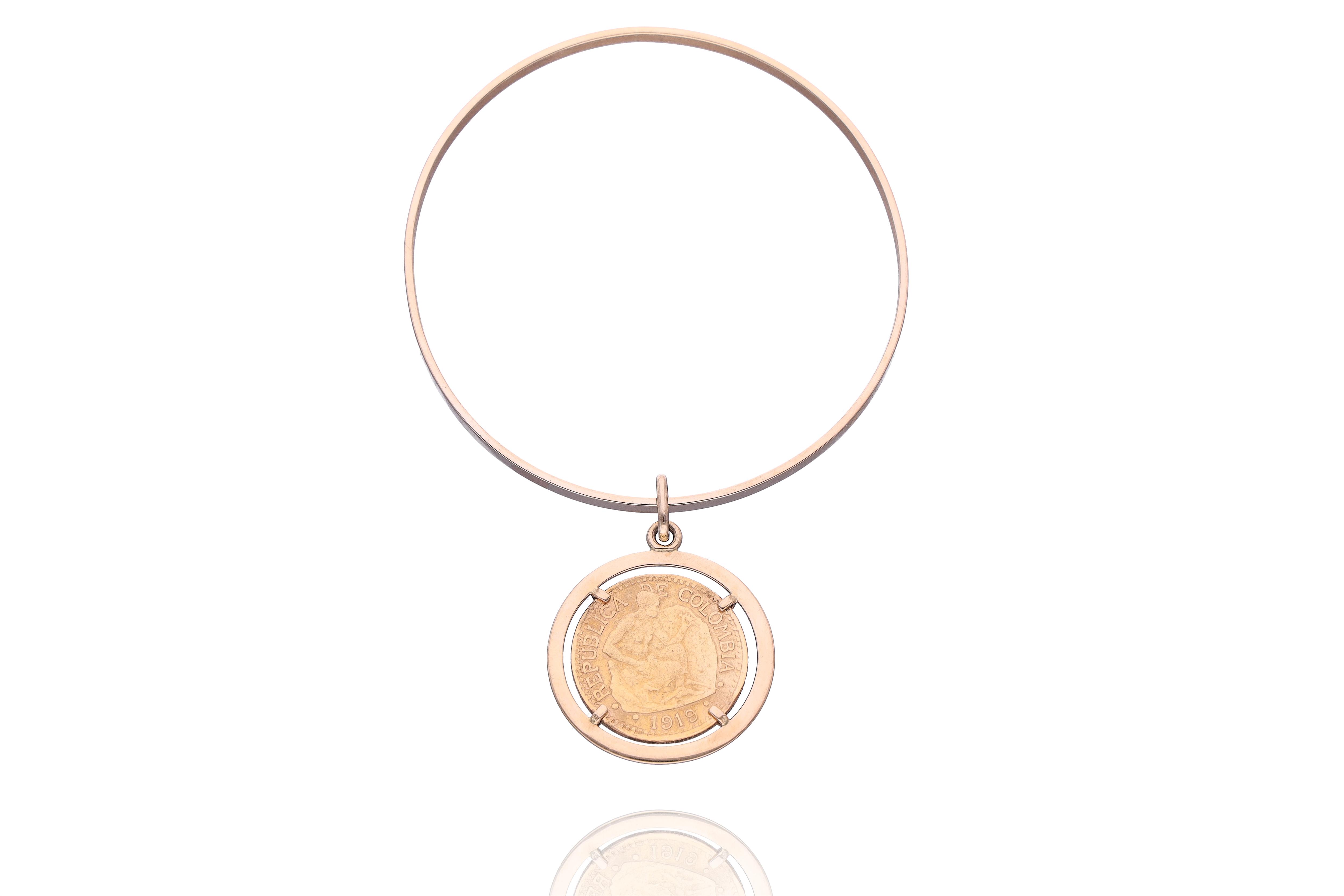 Bracciale con medaglia - Asta Preziosi