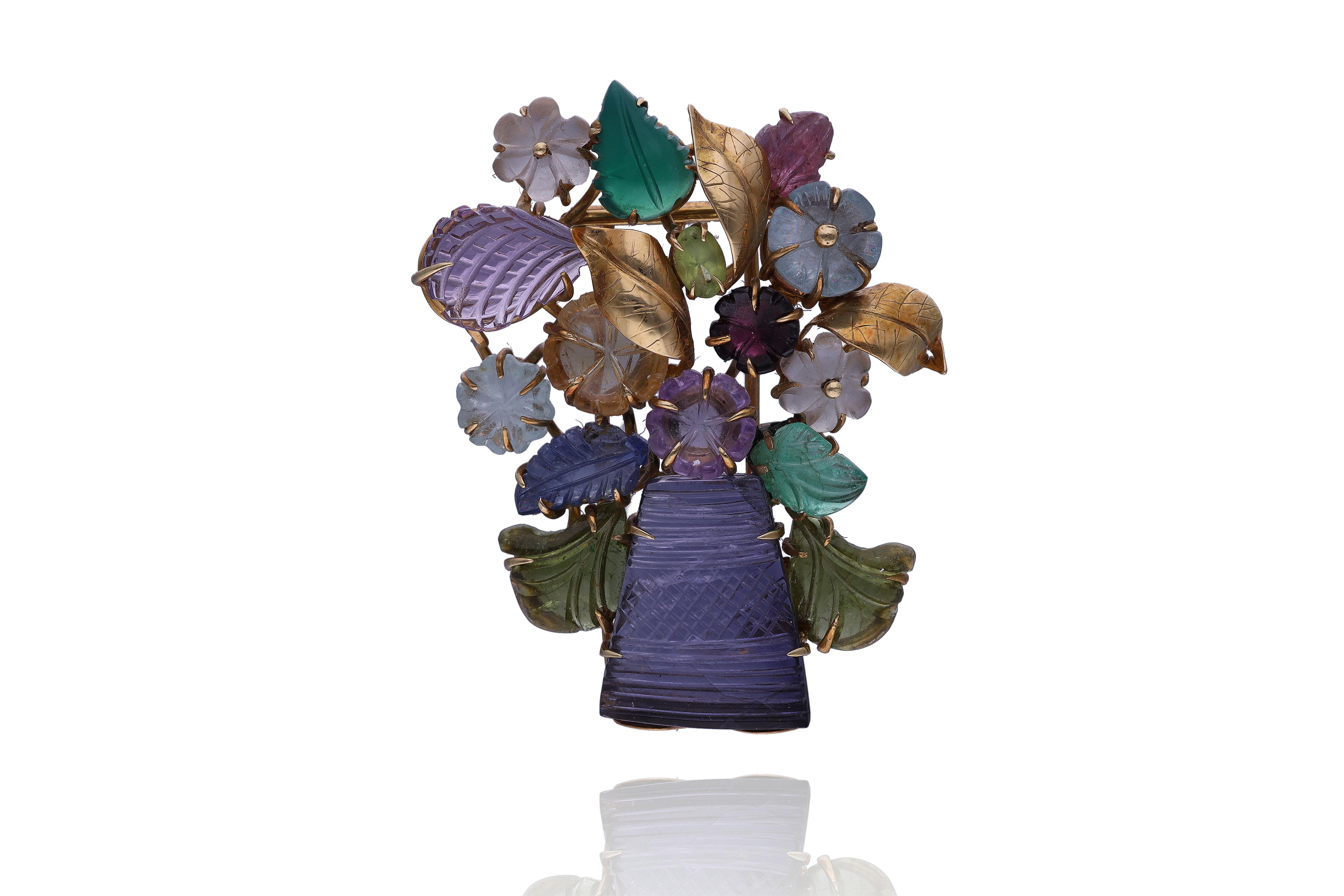 Spilla con iolite, tormaline, zaffiro, rubino, quarzi e pietre - Asta Preziosi