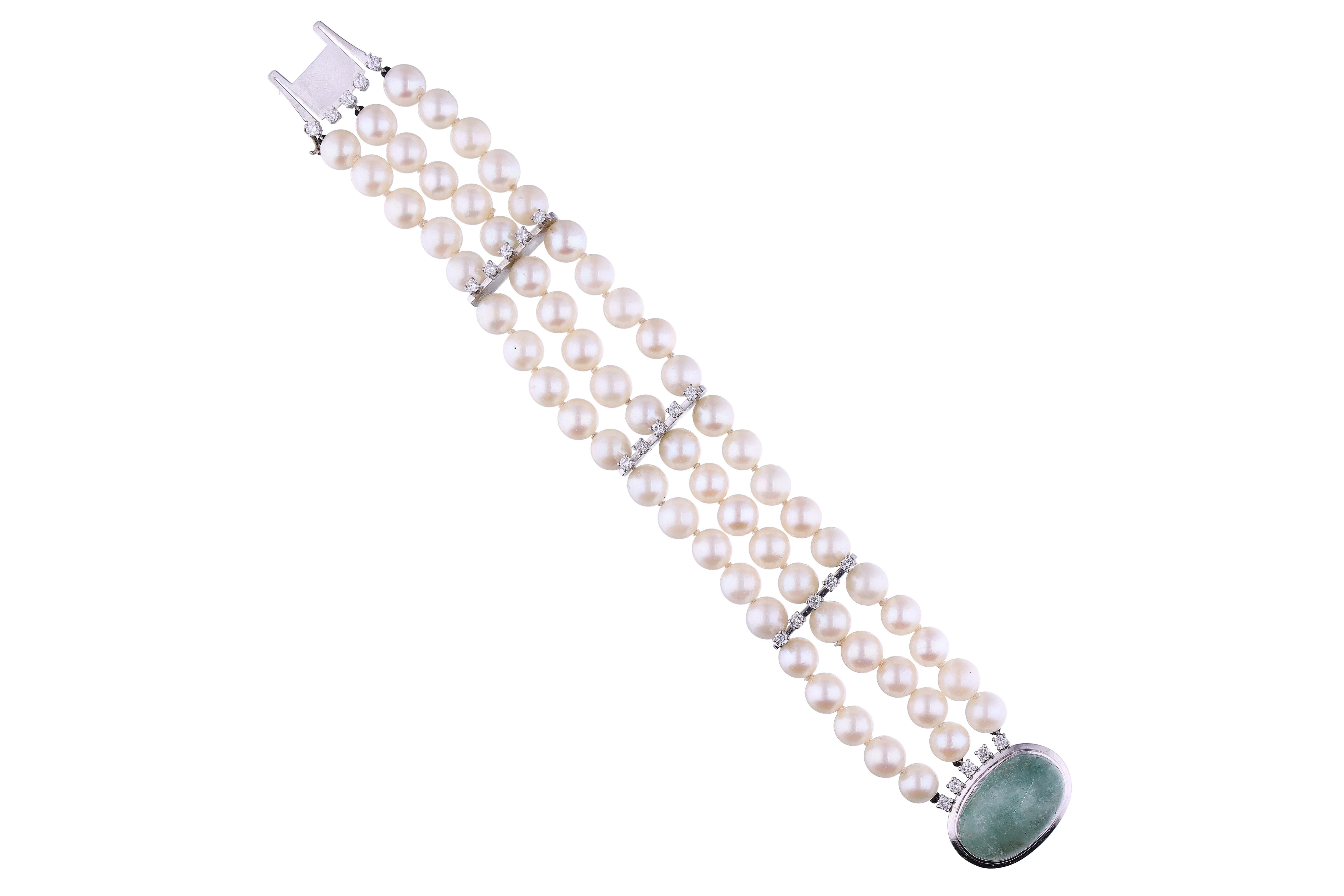 Bracciale di perle coltivate con smeraldo e diamanti - Asta Preziosi Bracciale di perle coltivate con smeraldo e diamanti - Asta Preziosi