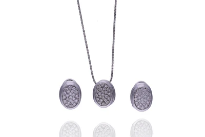 Damiani, collana con pendente e orecchini - Asta Preziosi