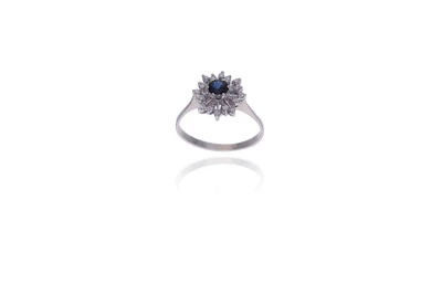 Anello con diamanti e zaffiro - Asta Preziosi