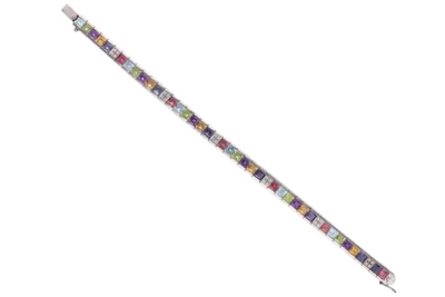 Bracciale con diamanti, tormaline, peridoti, ametiste, topazi, ioliti, quarzi gialli - Asta Preziosi