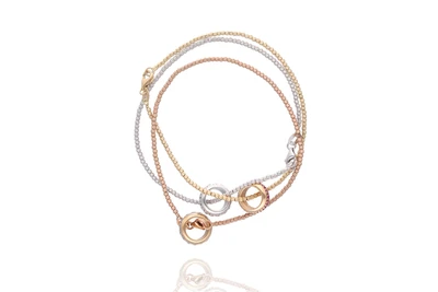 Tre bracciali con 3 ciondoli con diamanti e rubini - Asta Preziosi