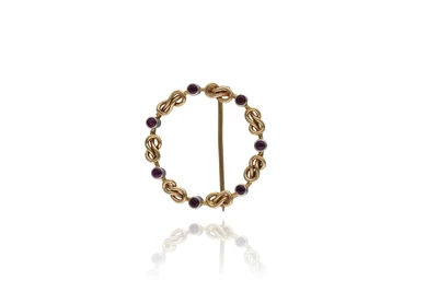 Spilla con rubini realizzata in oro giallo 750 - Asta Preziosi