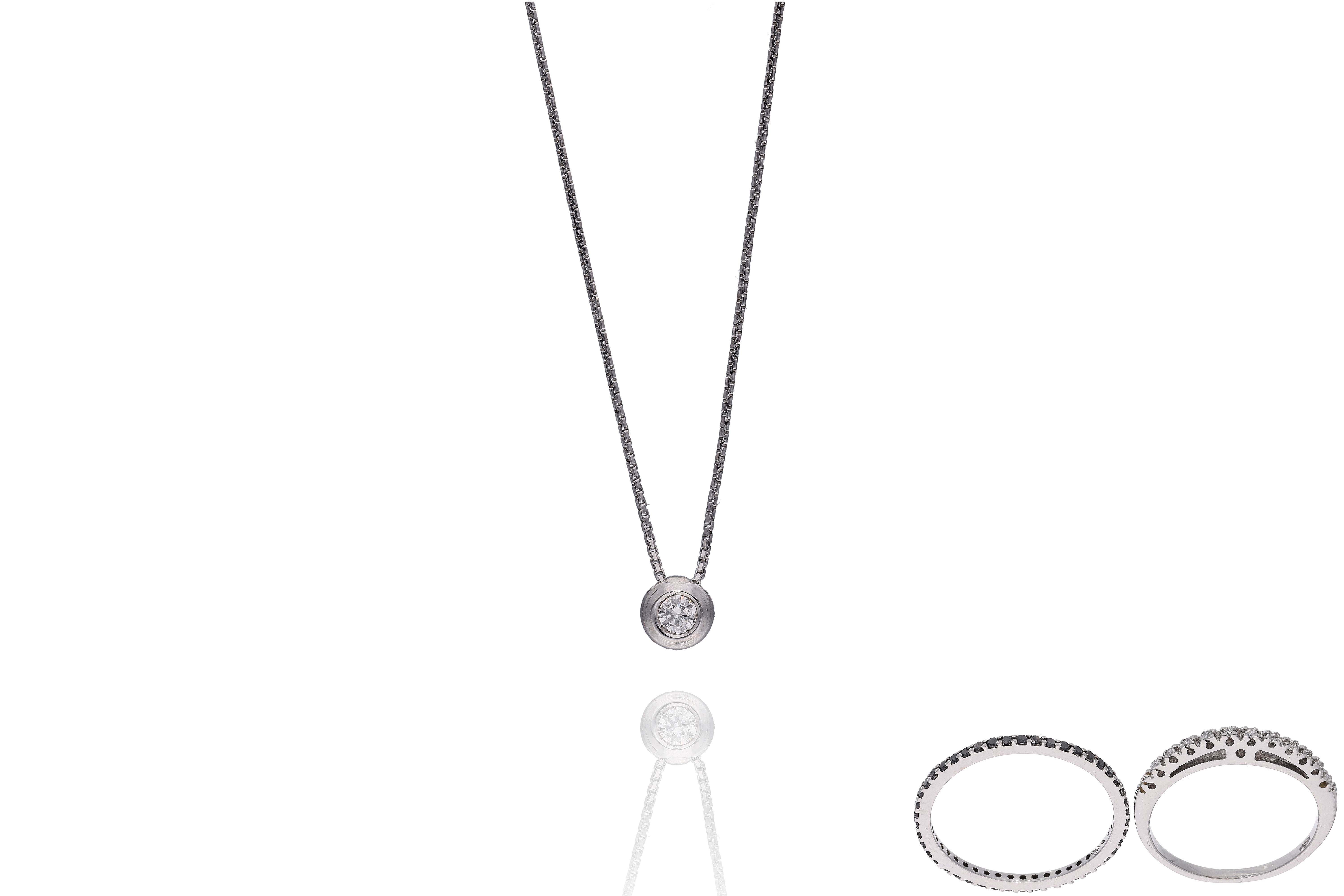 Parure composta da collana e due anelli con diamanti - Asta Preziosi