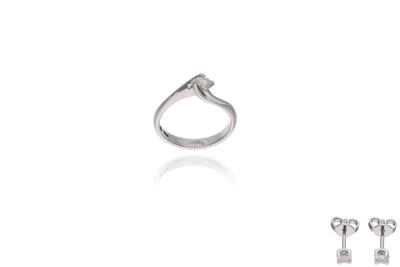 Parure composta da anello e orecchini con diamanti - Asta Preziosi Parure composta da anello e orecchini con diamanti - Asta Preziosi