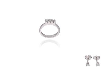 Parure composta da anello e orecchini con diamanti - Asta Preziosi Parure composta da anello e orecchini con diamanti - Asta Preziosi