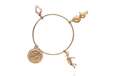 Bracciale rigido con quattro ciondoli - Asta Preziosi