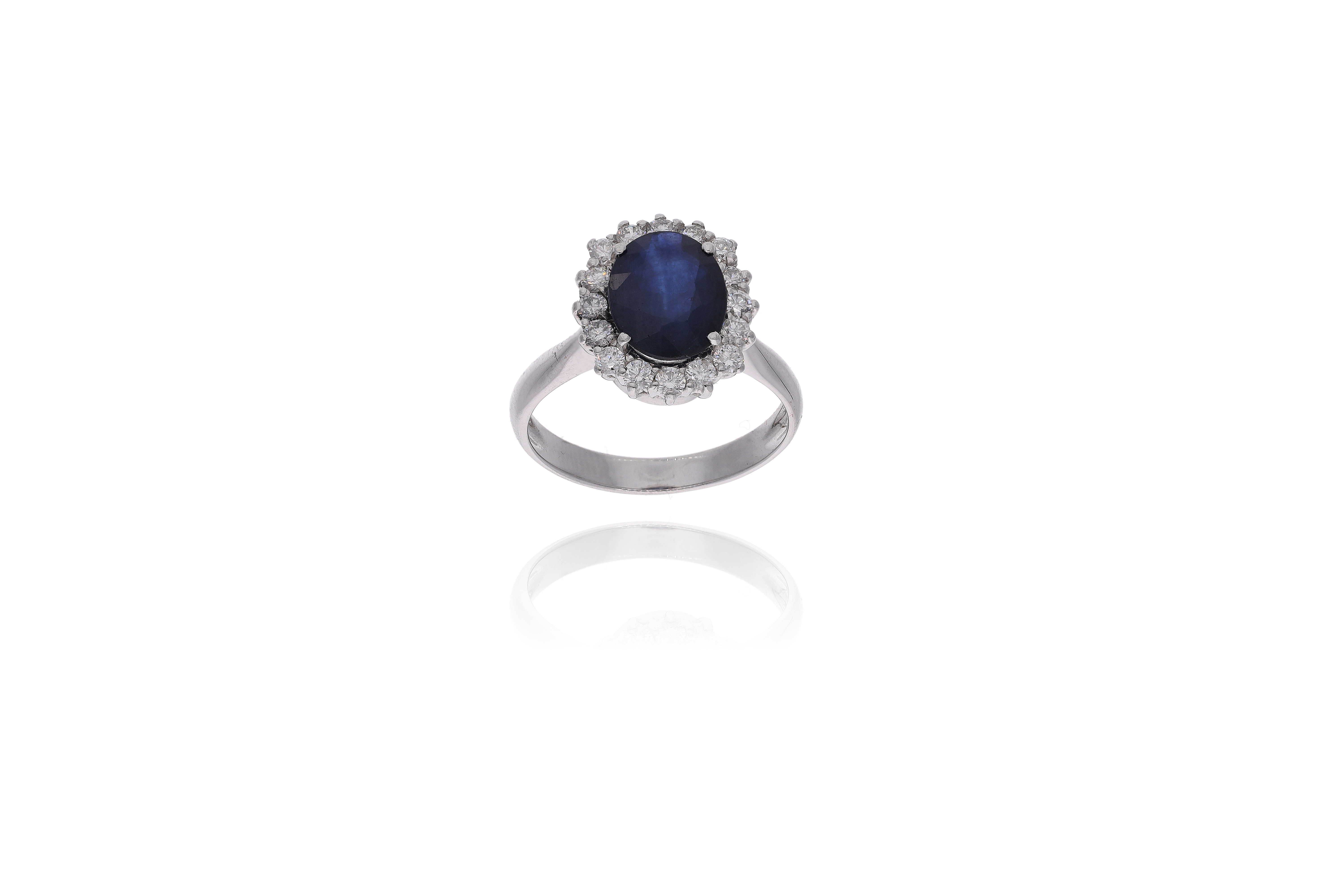 Anello con pietra centrale e diamanti - Asta Preziosi
