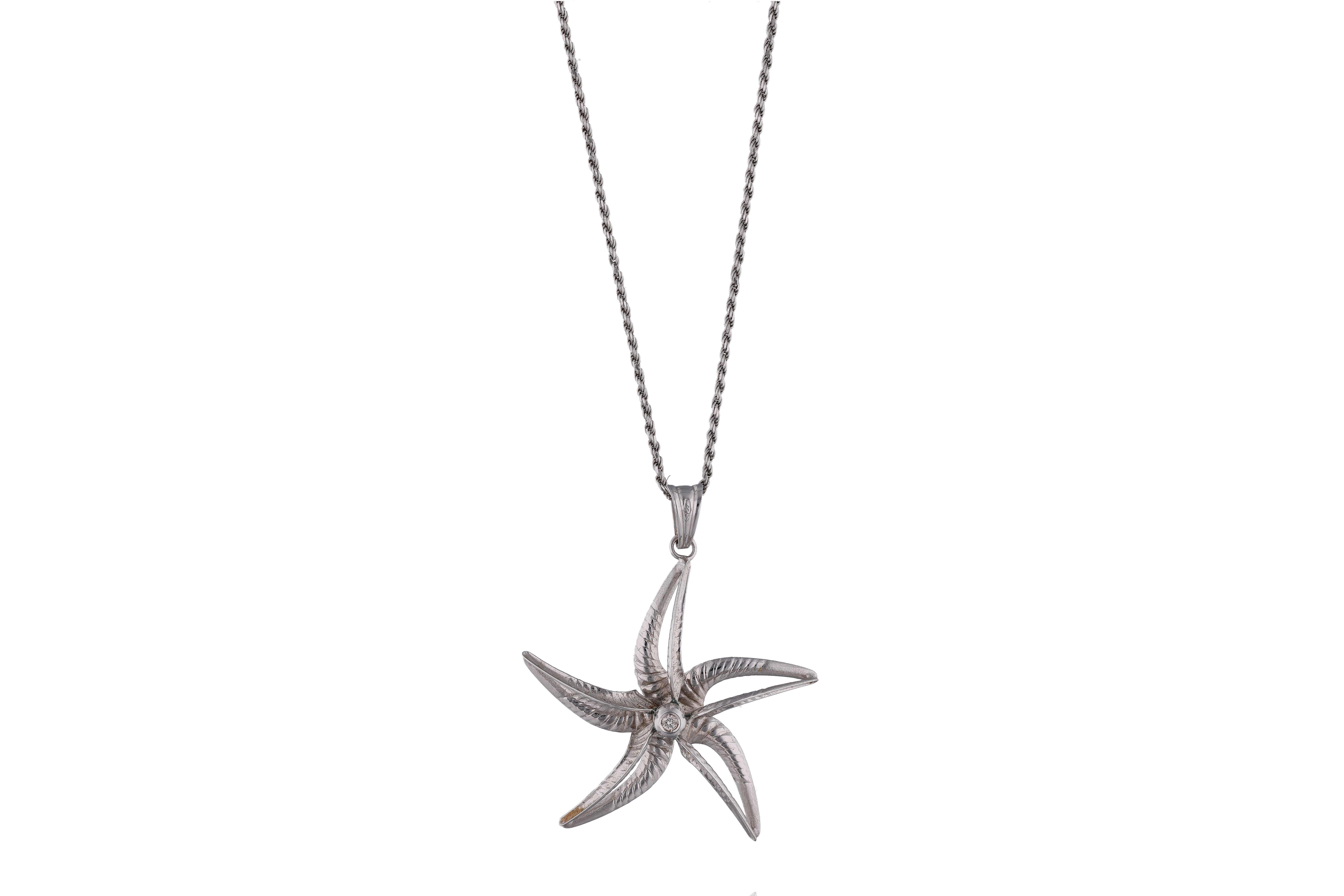 Collana con ciondolo a forma di fiore con diamante - Asta Preziosi