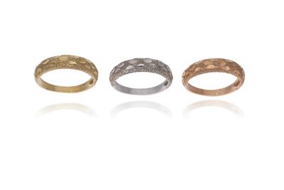 Tre anelli in oro tre colori - Asta Preziosi