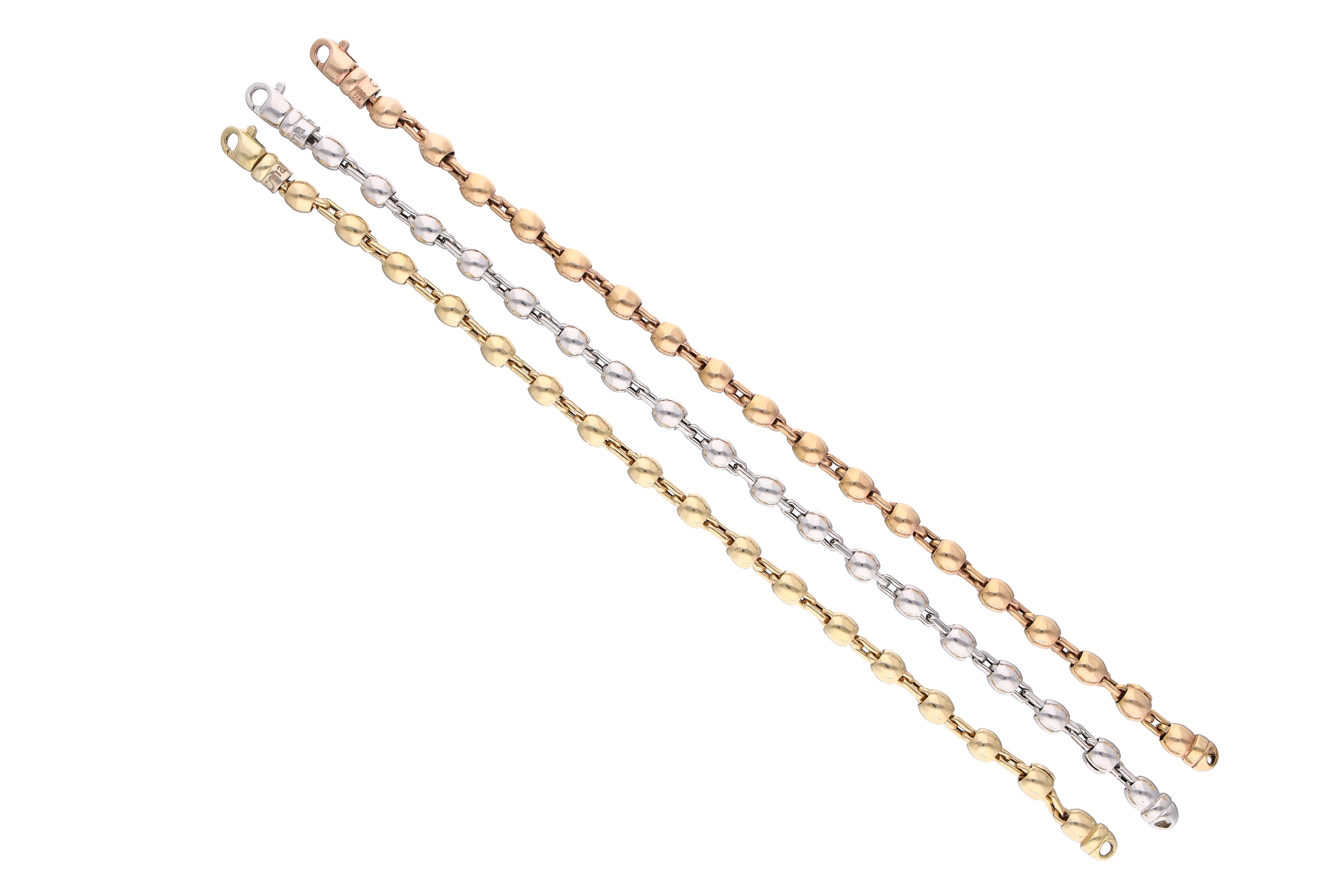 Tre bracciali in oro tre colori - Asta Preziosi