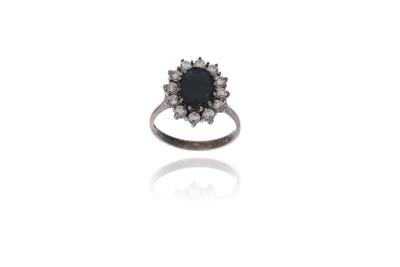 Anello con diamanti e zaffiro - Asta Preziosi