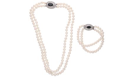 Parure collana e bracciale con perle coltivate, zaffiri e diamanti - Asta Preziosi