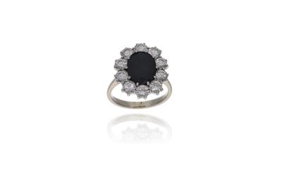 Anello con diamanti e zaffiro - Asta Preziosi Anello con diamanti e zaffiro - Asta Preziosi