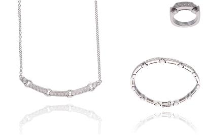 Parure collana anello e bracciale con diamanti - Asta Preziosi Parure collana anello e bracciale con diamanti - Asta Preziosi