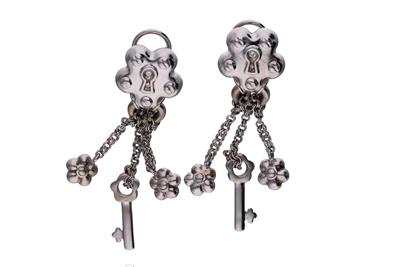 Paio di orecchini in oro - Asta Preziosi