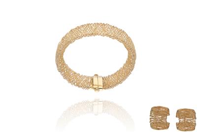 Parure bracciale e paio di orecchini in oro - Asta Preziosi