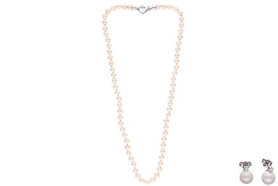 Parure collana e orecchini con perle e diamanti - Asta Preziosi Parure collana e orecchini con perle e diamanti - Asta Preziosi
