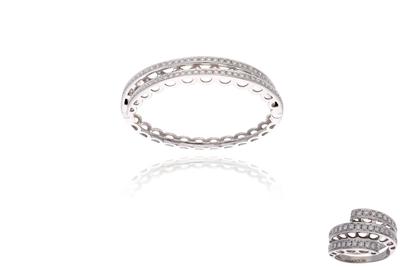 Damiani, parure anello e bracciale con diamanti - 