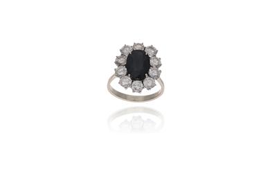 Anello con zaffiro e damanti - Asta di San Valentino Anello con zaffiro e damanti - Asta di San Valentino