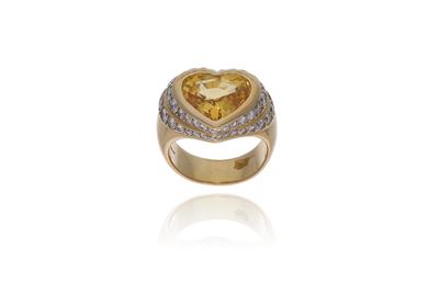 Anello con zaffiro giallo e diamanti - Asta di San Valentino Anello con zaffiro giallo e diamanti - Asta di San Valentino