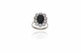 Anello con zaffiro e damanti - Asta di San Valentino Anello con zaffiro e damanti - Asta di San Valentino