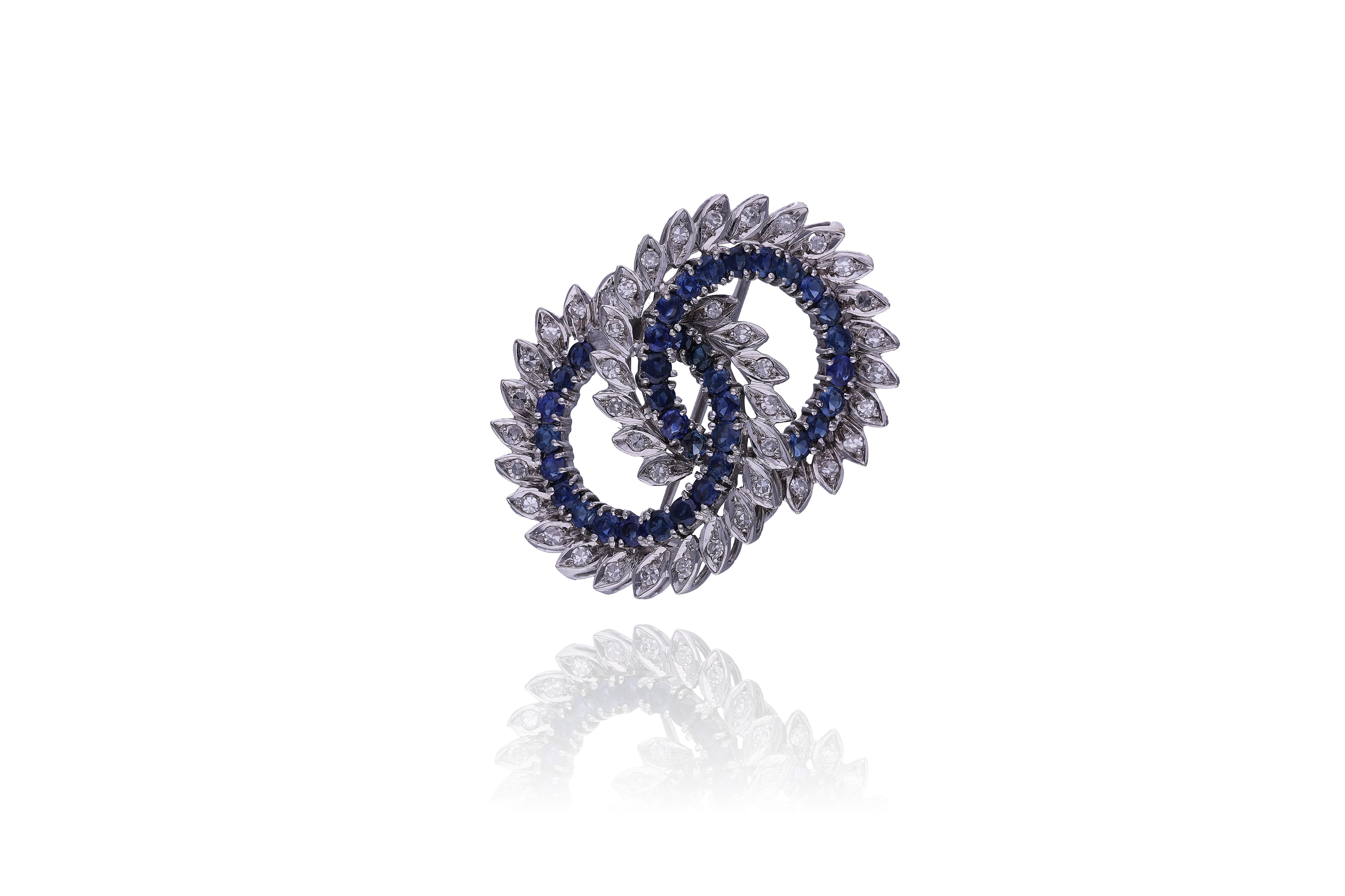 Spilla con diamanti e zaffiri - VintageMania Spilla con diamanti e zaffiri - VintageMania