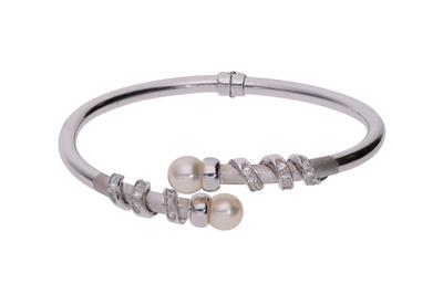 Bracciale rigido con pietre e perle - Asta Preziosi Bracciale rigido con pietre e perle - Asta Preziosi