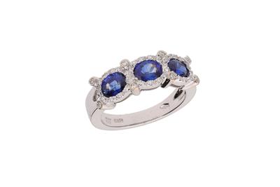 Anello con diamanti e pietre blu - Asta Preziosi