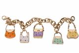 Bracciale con charms a forma di borsa - Asta Preziosi Bracciale con charms a forma di borsa - Asta Preziosi