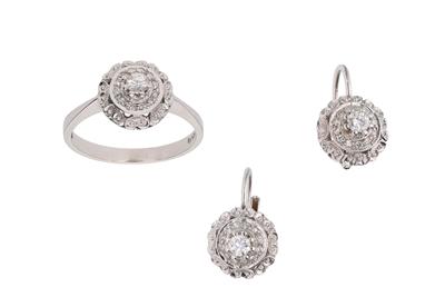 Anello e paio orecchini con diamanti - Asta Preziosi Anello e paio orecchini con diamanti - Asta Preziosi