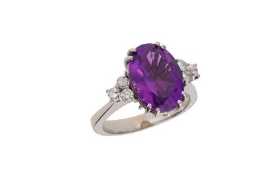 Anello con diamanti e pietra viola - Asta Preziosi Anello con diamanti e pietra viola - Asta Preziosi