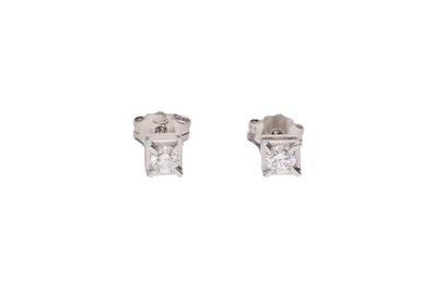 Paio di orecchini punto luce con diamante e pietra incolore - Asta Preziosi Paio di orecchini punto luce con diamante e pietra incolore - Asta Preziosi