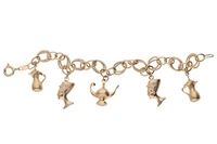Bracciale con charms - Asta Preziosi