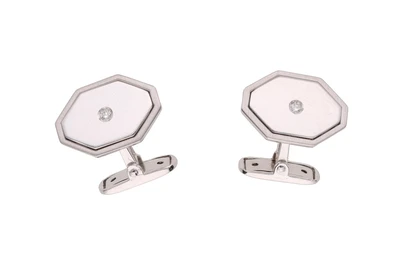 Coppia di fermapolsi ottagonali con diamanti - Asta Preziosi Coppia di fermapolsi ottagonali con diamanti - Asta Preziosi